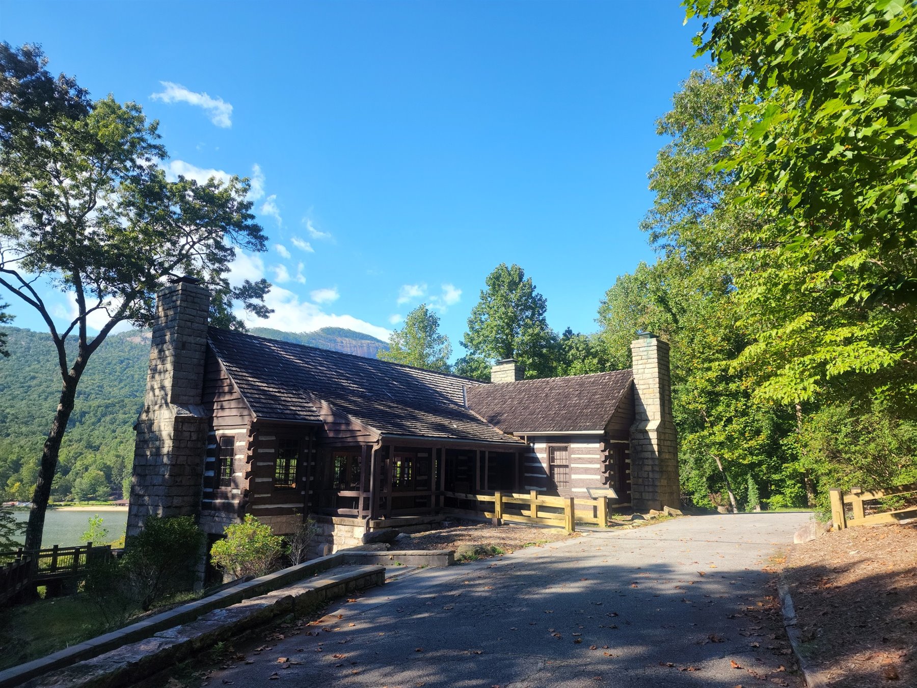 Historic rustic building with Table Rock mountain behind it
