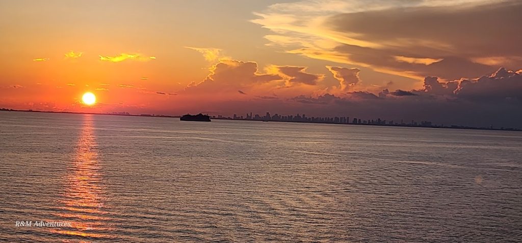 Sunset Leaving Miami with a cruise ship in the background