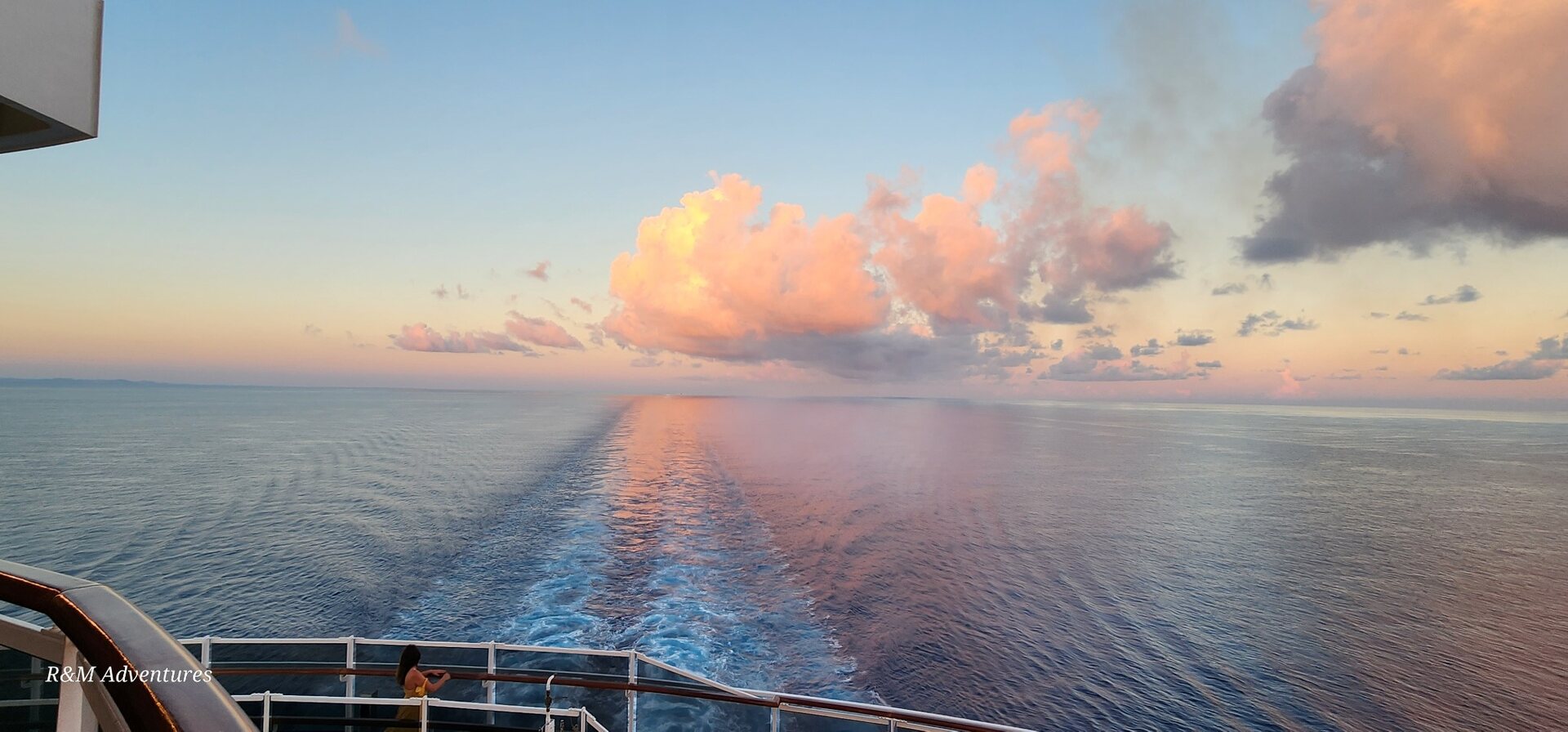 Cruise ship wake at sunset
